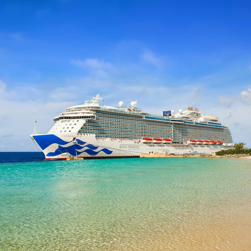 View from tropical beach on Cruise ship Royal Princess docked at port Willemstad.