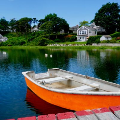 A rowboat tied to a dock in Chatham, Massachusetts