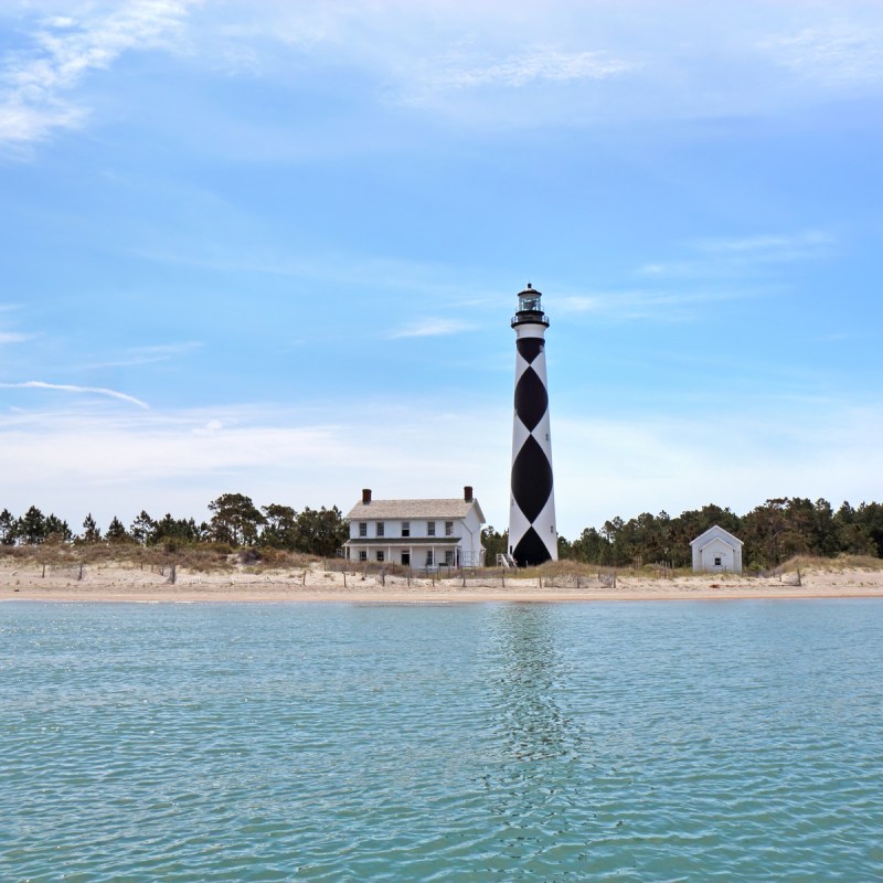 Cape Lookout Lighthouse on the Southern Outer Banks or Crystal Coast of North Carolina viewed from the water