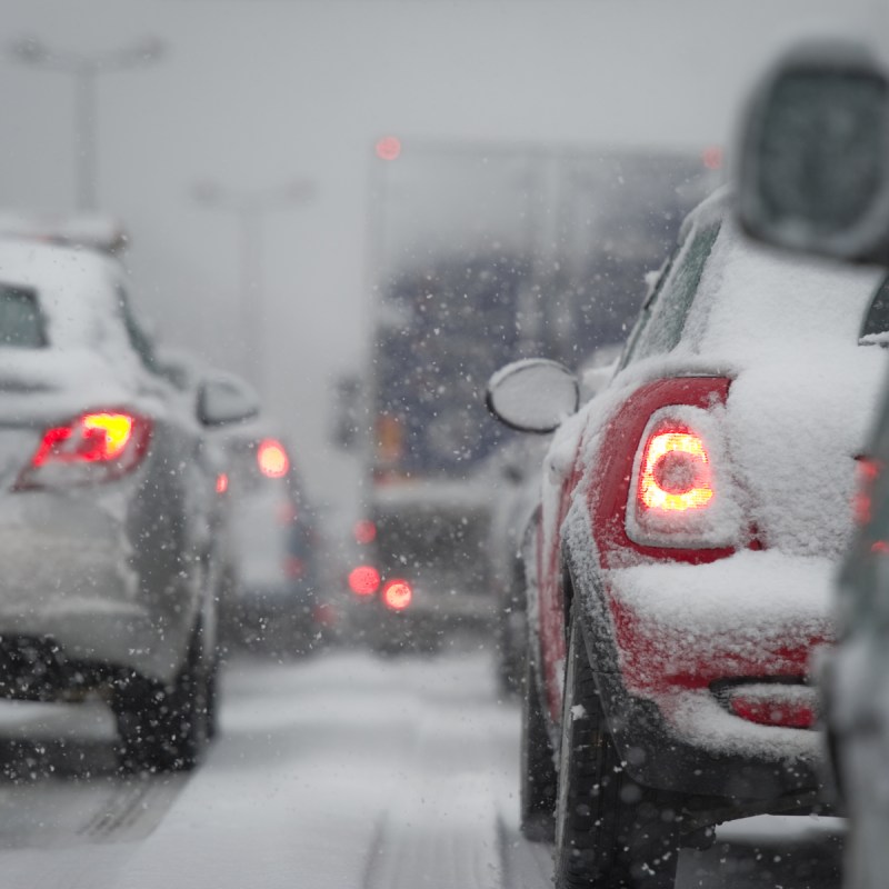 Cars driving in the snow.