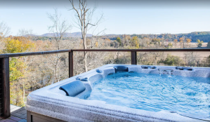 hot tub at vacation home in Asheville looking out over Blue Ridge Mountains