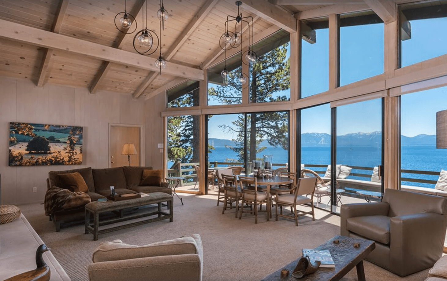 View of Lake Tahoe through windows of Meeks Bay vacation rental in Lake Tahoe