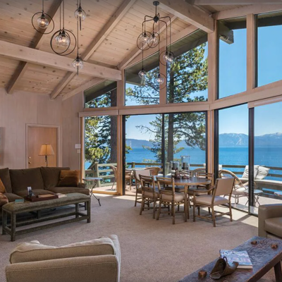 View of Lake Tahoe through windows of Meeks Bay vacation rental in Lake Tahoe