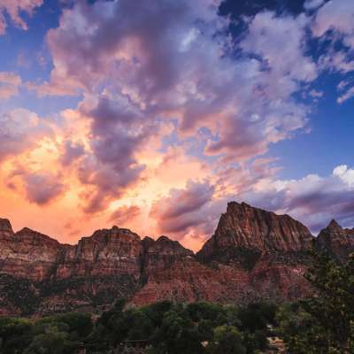 sunset over red rocks at Watchman Campground near Zion National Park