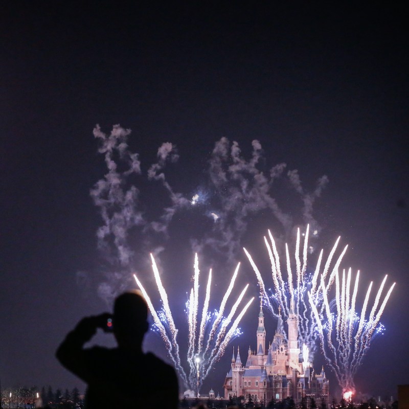 Fireworks explode over Shanghai Disneyland.