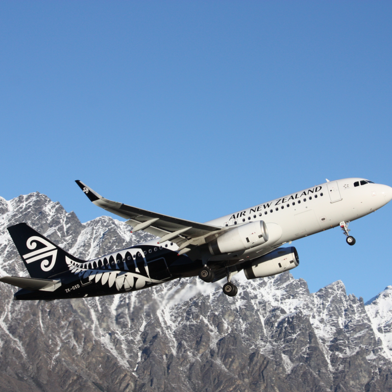Airplane Air New Zealand take-off from Queenstown.