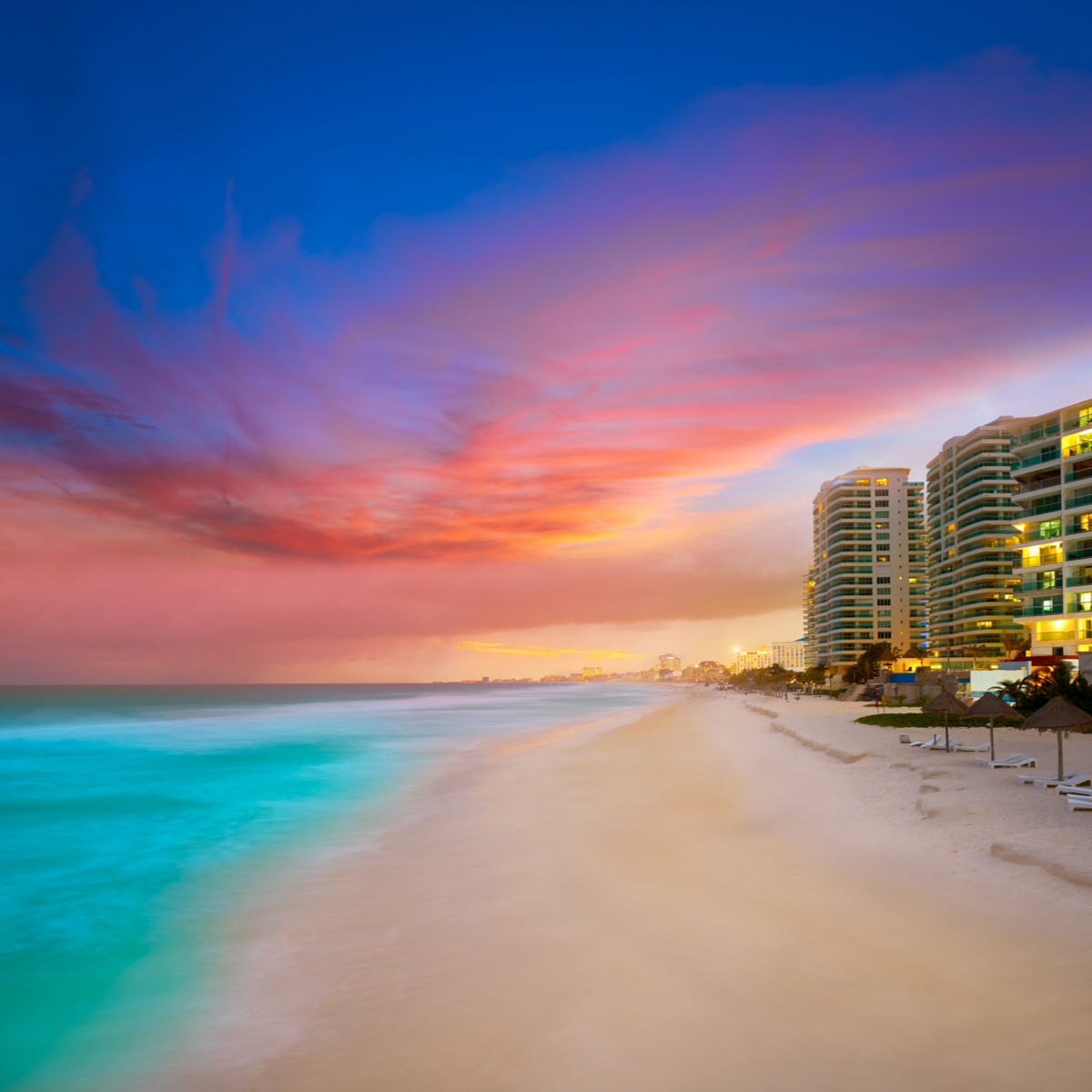 Cancun Forum Beach sunset in Mexico at Hotel zone hotelera Playa Gaviota Azul
