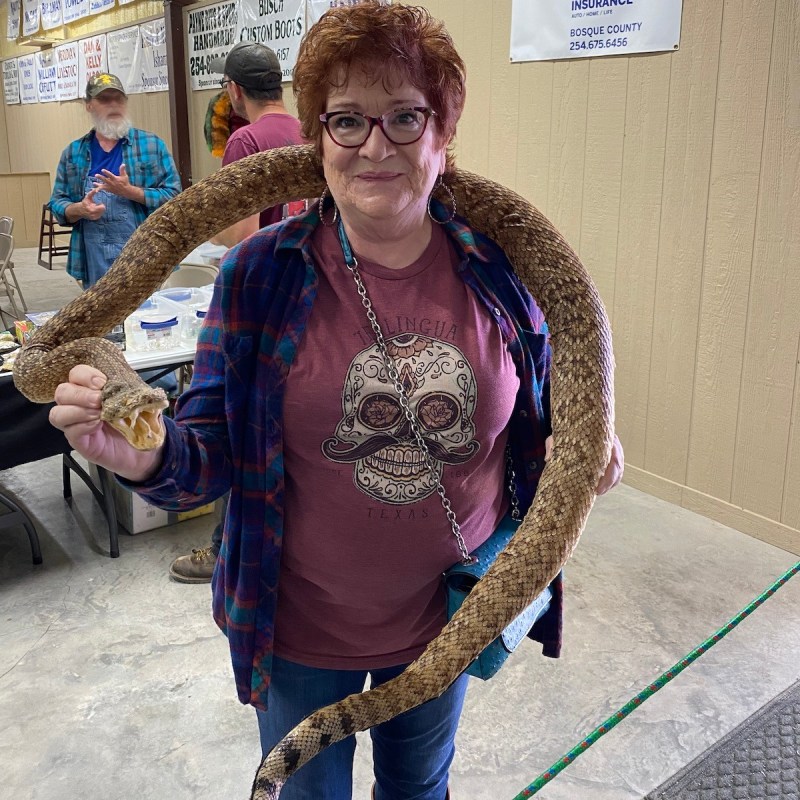 Author, Janie Pace, holding a Rattlesnake.