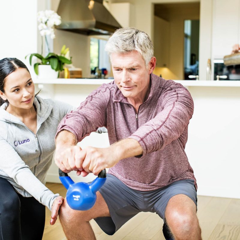 Luna physical therapist helping patient at home