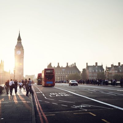 people on Westminster Bridge at sunset, London, UK