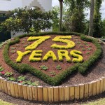 Flower celebration honoring 75th Anniversary at entrance.