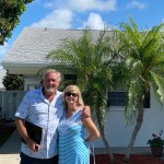 Joe and Julie Hederman in front of their townhome in a Florida retirement community