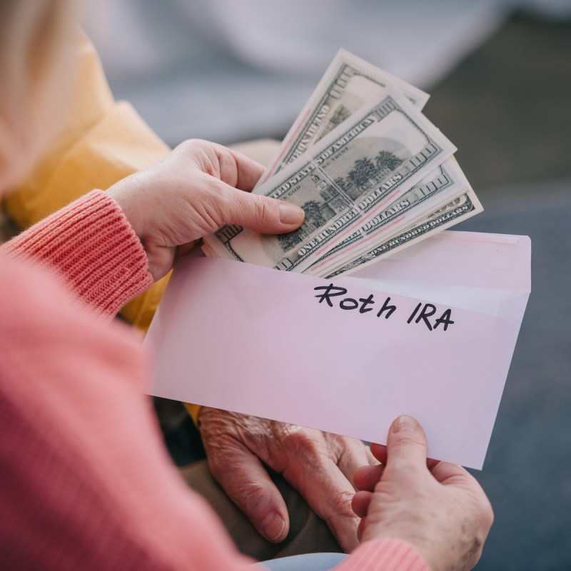 Woman saves money in Roth IRA