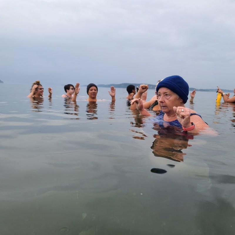 Kathy Gilman and the Puget Sound Plungers taking a cold plunge.