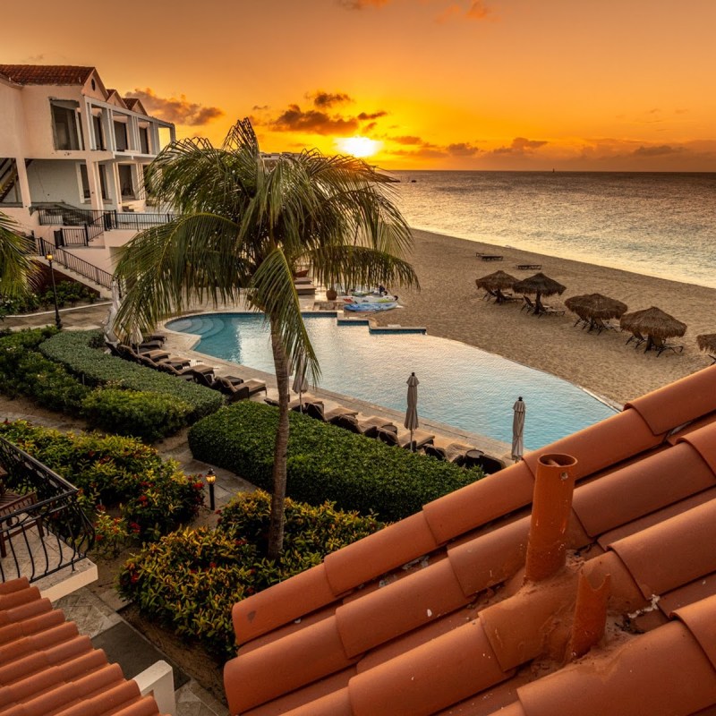 An incredible sunset over the infinity pool at Frangipani Beach Resort in Anguilla.