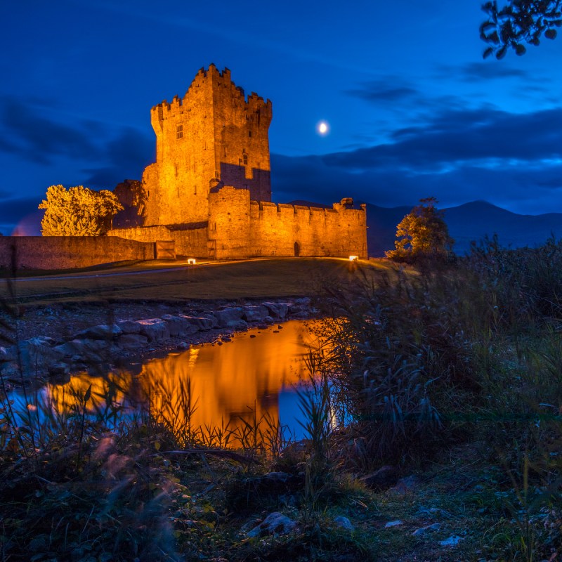 Ross Castle at dusk in Killarney, Ireland.