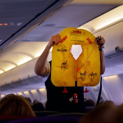 Flight attendants during Pre-flight safety demonstration