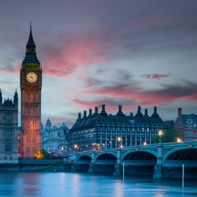 Big Ben and Westminster Bridge at sunset in London, England