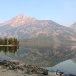 The mirror surface of Jenny Lake in Grand Teton National Park