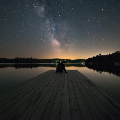 A person stargazing in Muskoka, Ontario