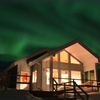 Northern lights above the Quaint Cottage On The Grand Snaefellsnes Peninsula in Iceland
