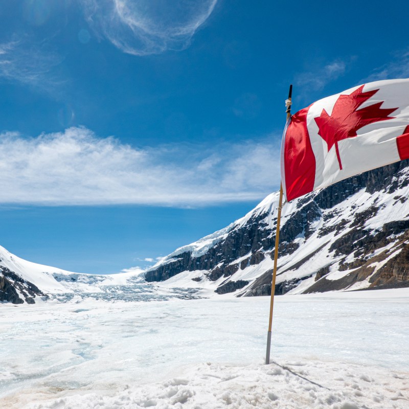 Athabasca Glacier, Canadian flag, Columbia Icefield in Banff