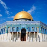 golden domed temple with blue and white tile