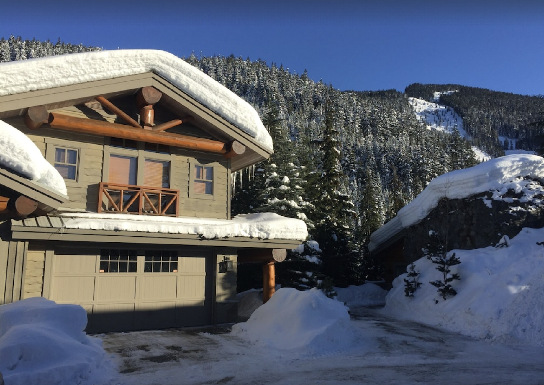 Snow covering The Heights Vrbo rental in Whistler