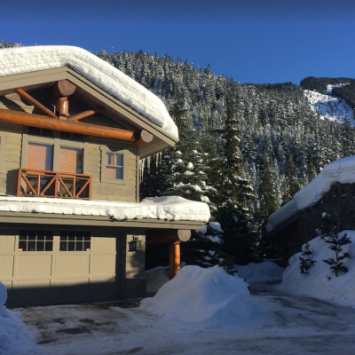 Snow covering The Heights Vrbo rental in Whistler