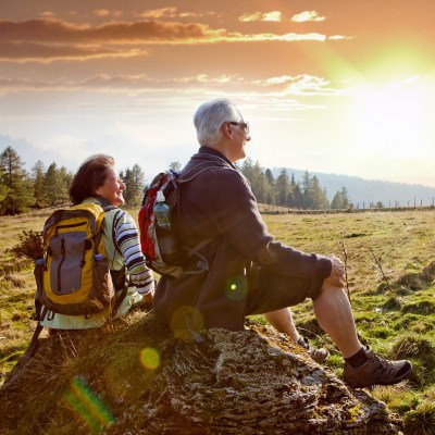 seniors hiking in nature on an autumn day