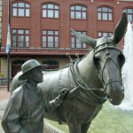 Man and mule sculpture at Canal Place Plaza in Cumberland, Maryland