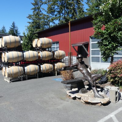 Statue and barrels at Eagle Harbor Winery in Bainbridge Island, Washington.