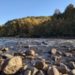 The Nolichucky River flowing past USA Raft Adventure Resort in Erwin, Tennessee.