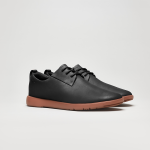 pair of black Ponto shoes with brown outsoles