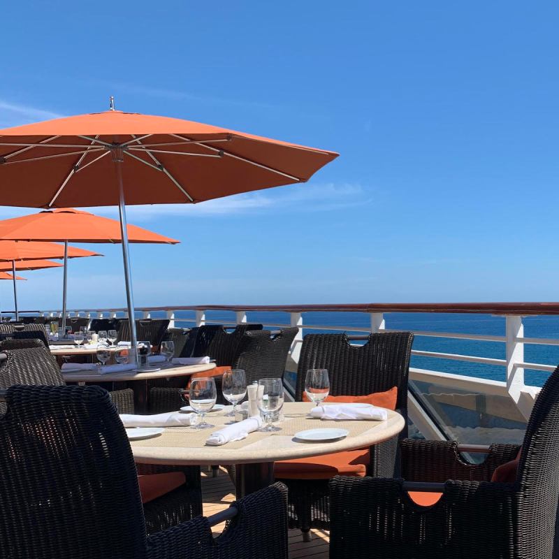 Outdoor dining at the Terrace Cafe on Ocean Cruises' Riviera.