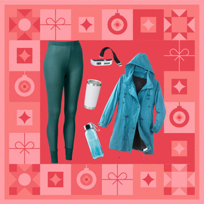 long underwear, water bottle, travel tumbler, luggage scale, and rain coat on red holiday background