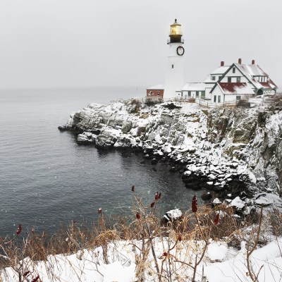 Lighthouse on the rocks on the Atlantic coast. The oldest lighthouse in Maine. USA. Portland