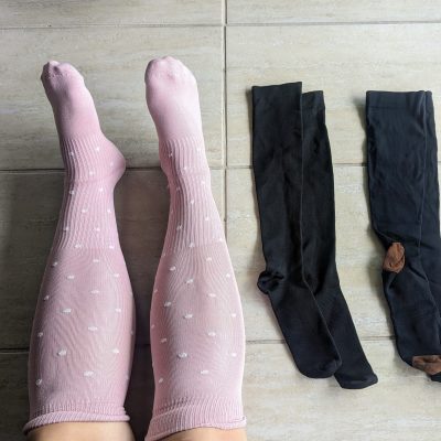 Author showcasing her compression socks