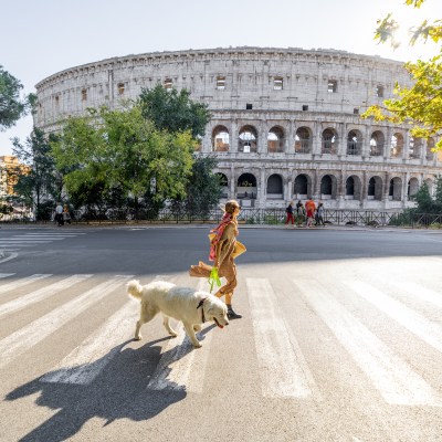 Woman crossing street in Rome