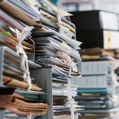 Stacks of files and papers