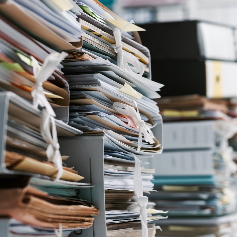 Stacks of files and papers