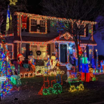 house decorated with Christmas lights at night