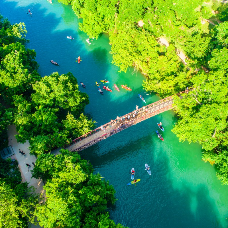 Kayakers under the Barton Creek Bridge