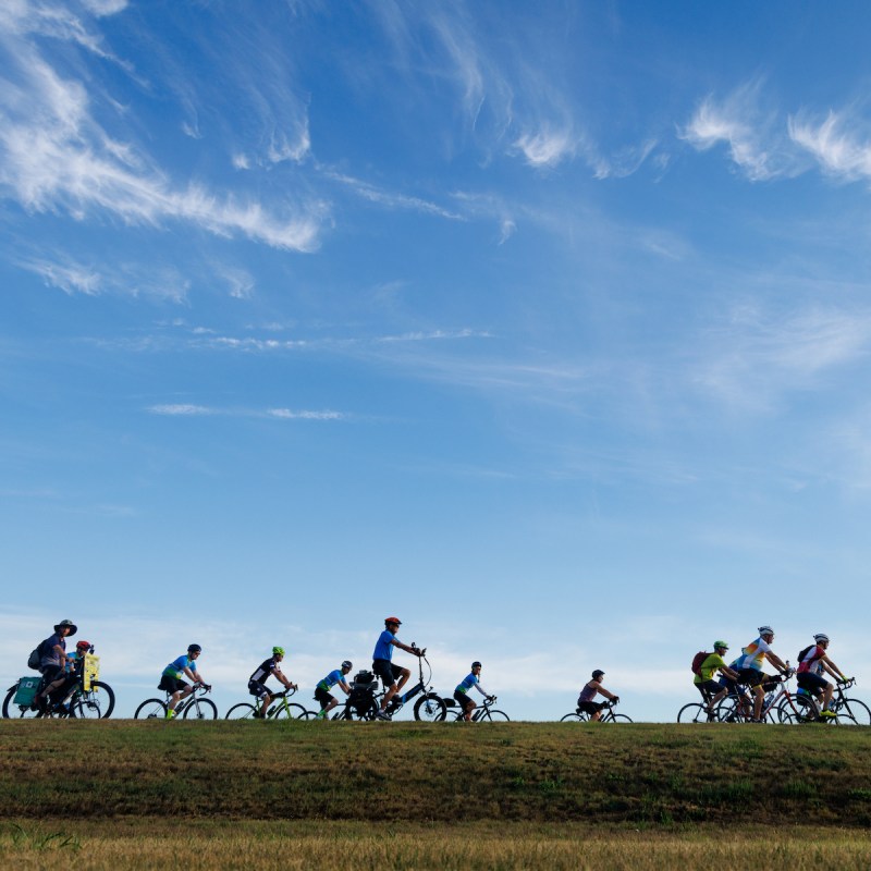 Cyclists on RAGBRAI make their way from Sergeant Bluff to the day 1 meeting town of Anthon