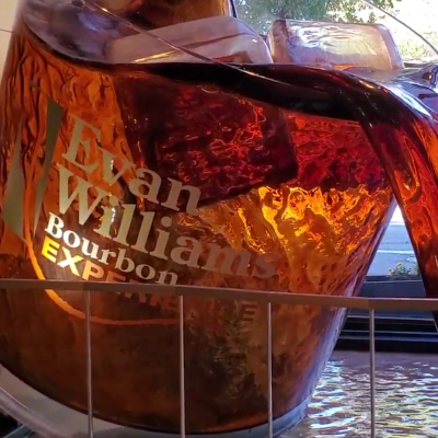 Evan Williams Bourbon Experience sculpture that looks like a whiskey glass spilling. Louisville, Kentucky.