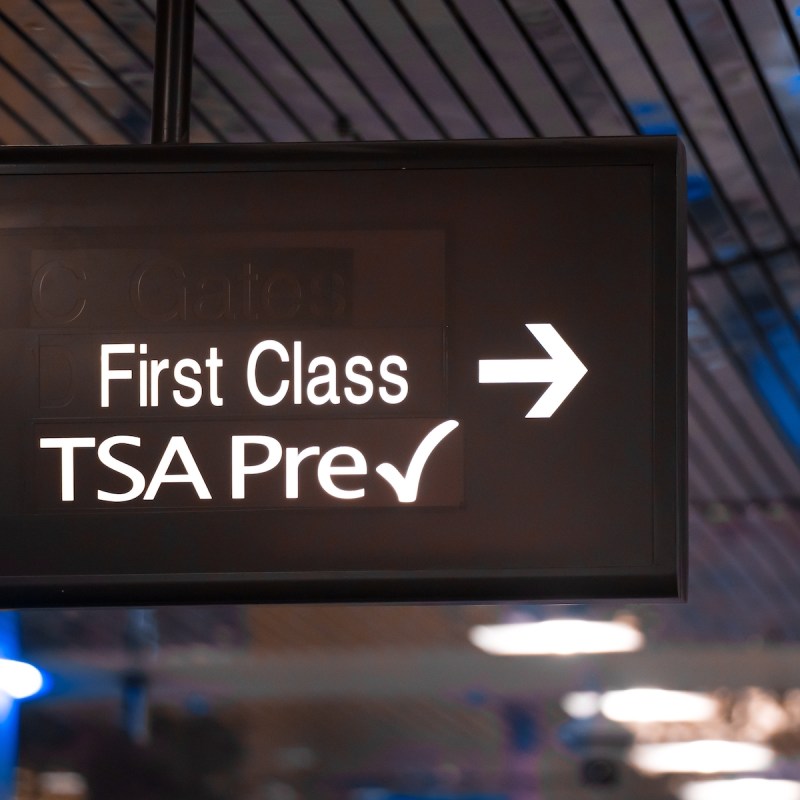 Overhead sign showing security check point lanes