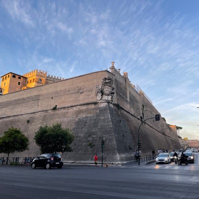 Walking past the enormous walls surrounding the Vatican