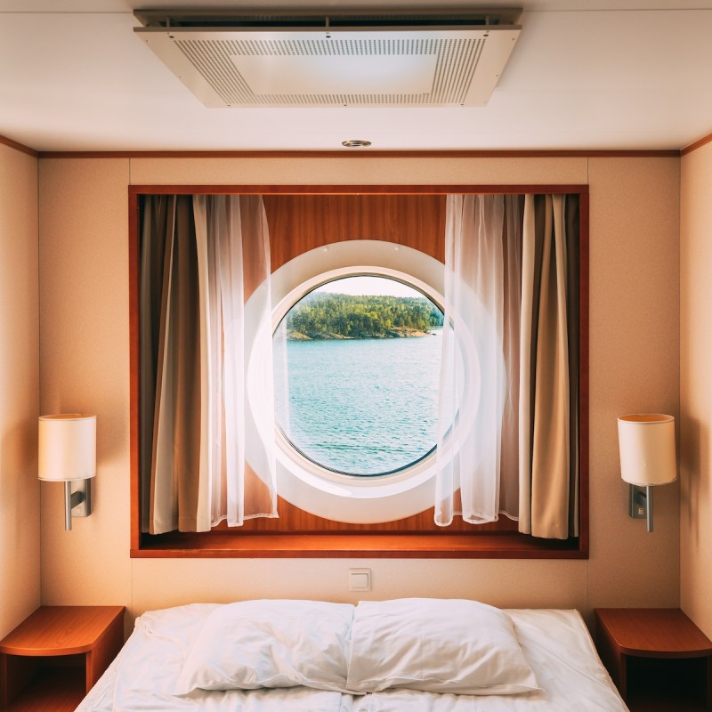 Cruise ship cabin window with a water view