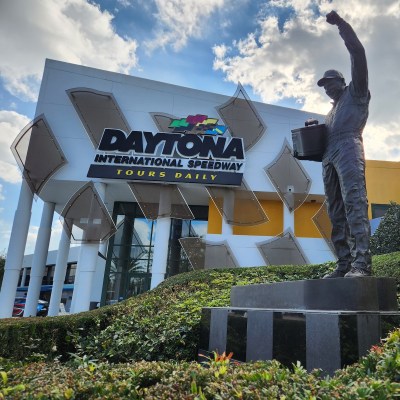 A commemorative statue of racing legend welcoming visitors to the Daytona International Speedway