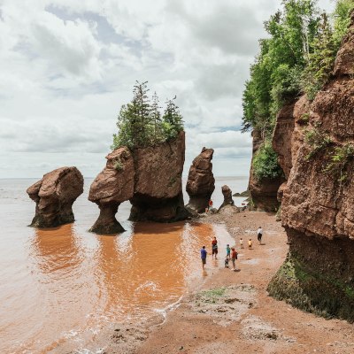 The tide rising at the famous Lovers Arch formation at Hopewell Rocks Provincial Park
